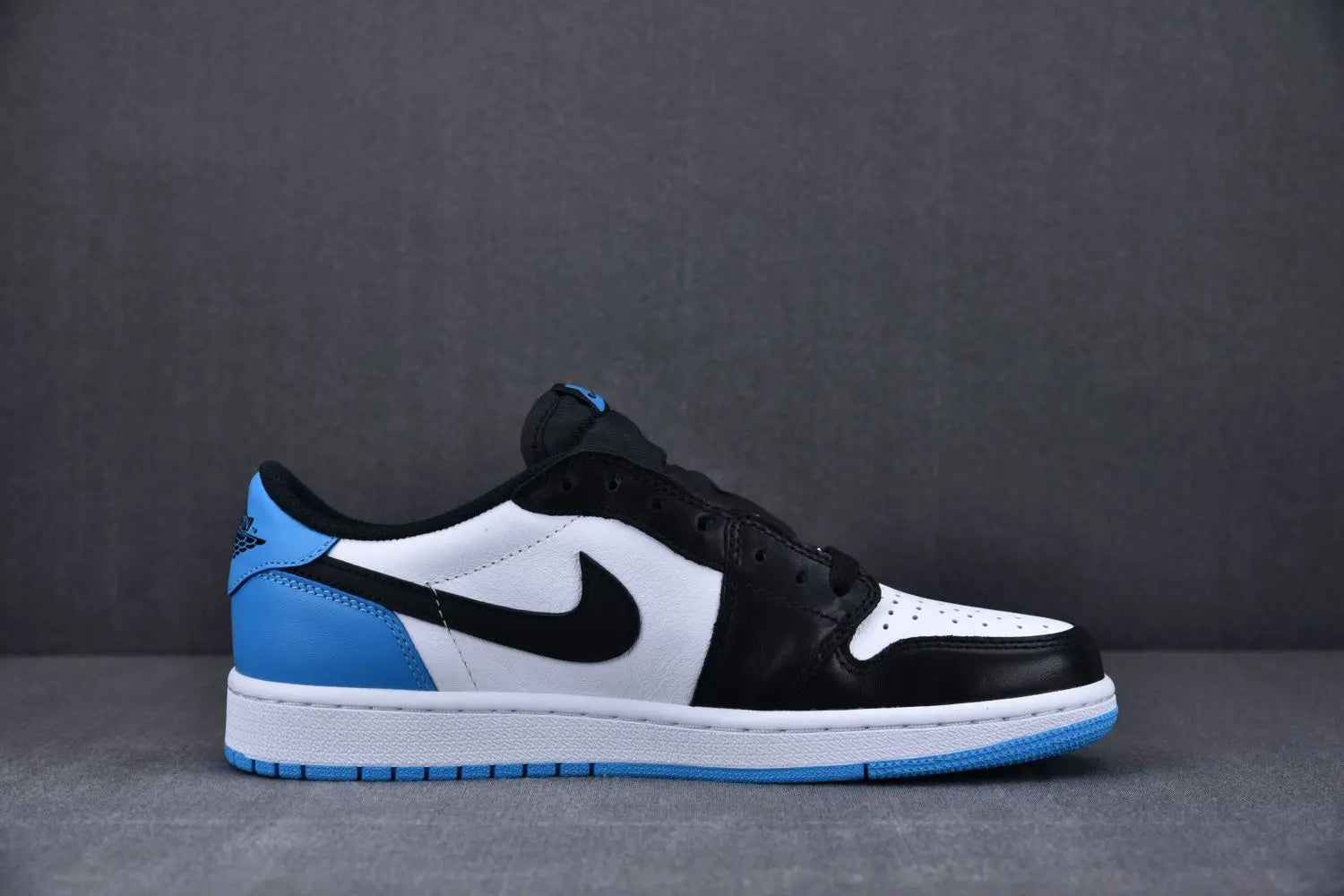 AIR JORDAN 1 LOW “Black Dark Powder Blue” Metroutfits