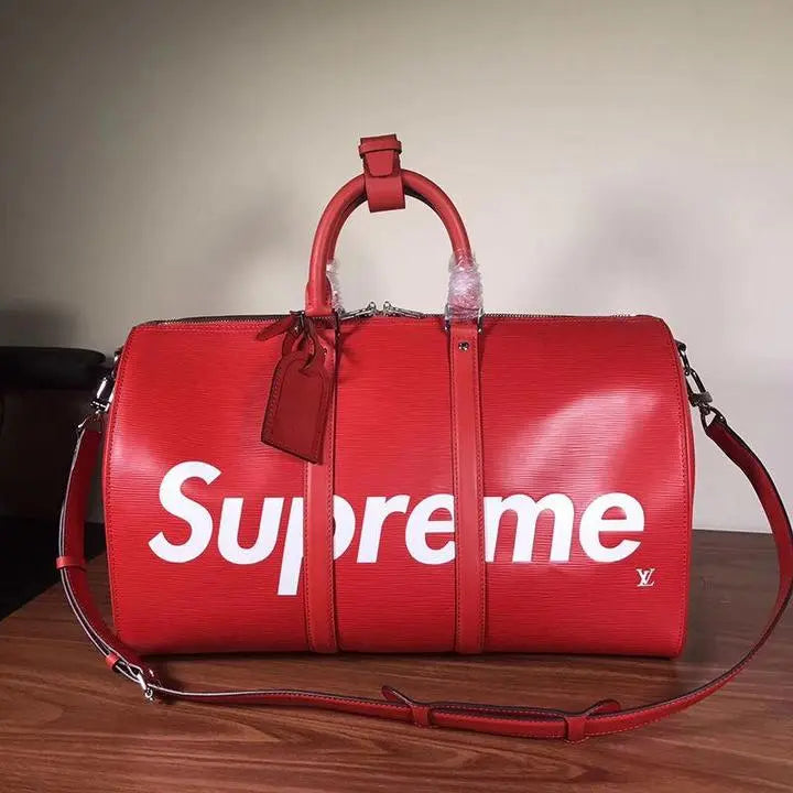LOUIS VUITTON X SUPREME - TRAVEL BAG - https://treadfitpro.com/