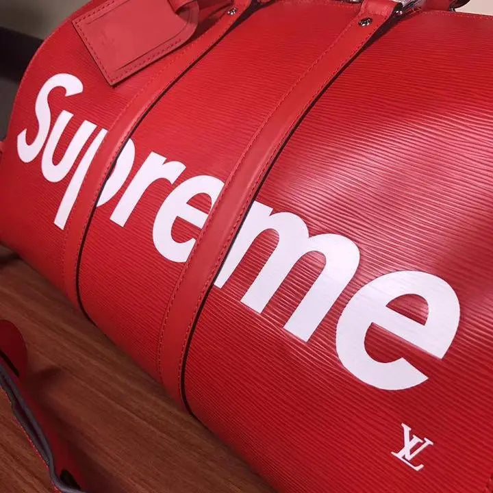 LOUIS VUITTON X SUPREME - TRAVEL BAG - https://treadfitpro.com/